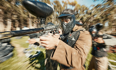 Image showing Paintball, shooting and speed with man in playground for battlefield, mission and soldier. Sports, games and fast with person and gun gaming in arena for challenge, adventure and warrior training