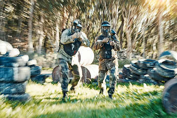 Image showing Teamwork, fast and paintball with man in game for playground, motion blur and gaming. Challenge, mission and soldier with people shooting in battlefield arena for target, gun and warrior training