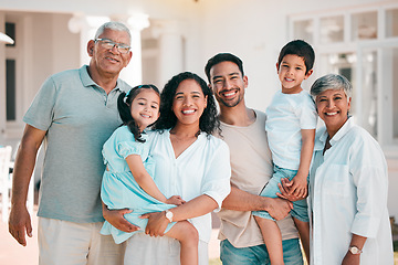 Image showing Happy, big family and portrait of parents, kids and grandparents outdoor at house, home or backyard in summer. Man, woman and children with senior people with smile on face for quality time together