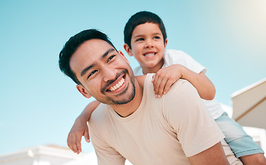 Image showing Happy, smile and piggyback with father and son in backyard for playful, support and airplane. Happiness, relax and love with man and child at family home for care, excited and games together