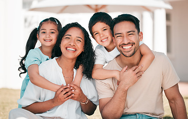 Image showing Kids, parents and happy family portrait together outdoor at house, home or backyard in summer with happiness on holiday. Man, woman and children with smile on face for bonding, time and vacation