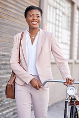 Image showing Business woman in city with bicycle, smile and sustainable morning commute walking on sidewalk. Eco friendly transport bike, cycling and happy African girl with urban transportation on work travel.