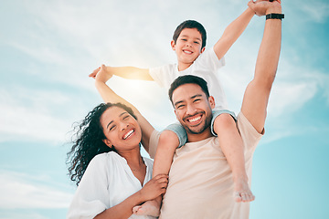 Image showing Happy family, portrait and airplane games at a beach with freedom, bond and fun together on blue sky background. Face, love and piggyback by parents and boy child outdoor for travel, holiday or trip