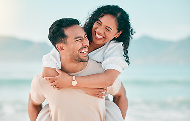 Image showing Love, smile and piggyback with couple on beach for travel, summer and vacation together. Peace, happy and relax with man and woman hugging on date for seaside holiday, care and mockup space