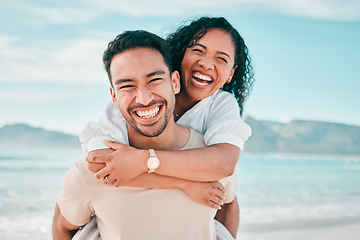 Image showing Love, portrait and piggyback with couple on beach for travel, summer and vacation together. Peace, smile and relax with man and woman hugging on date for seaside holiday, care and mockup space