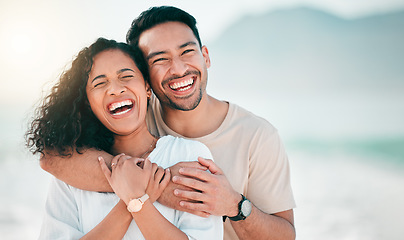 Image showing Love, happy and funny with couple on beach for travel, summer and vacation. Peace, smile and relax with portrait of man and woman hugging on date for seaside holiday, care and mockup space