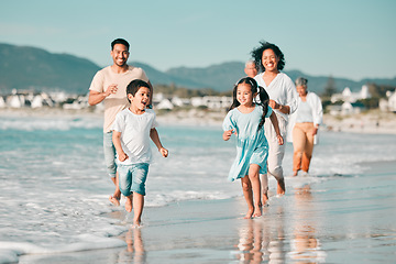Image showing Family running on the beach, ocean and energy with bonding on holiday, happiness and freedom with travel. Parents, young children and carefree with tropical vacation in Mexico, love and care outdoor