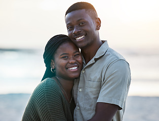 Image showing Black couple, happy and portrait outdoor at the beach with love, care and commitment. Smile on face of young african man and woman together on vacation, holiday or sunset travel adventure in Jamaica