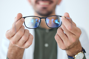 Image showing Man, hands and optician with glasses for vision, eyesight and prescription lens. Ophthalmology, frame and doctor with eyewear, spectacles for wellness and optometrist for medical healthcare in clinic