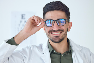 Image showing Face, man and optometrist smile with glasses for vision, healthcare or wellness. Portrait, happy and doctor of ophthalmology with frame, expert optician or medical professional for eye care in clinic