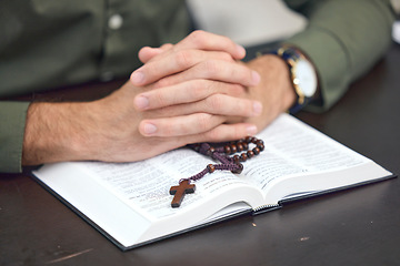 Image showing Bible, cross and hands, person praying with religion, faith and gratitude with trust in God. Crucifix, rosary beads and Christian holy book, spiritual and Jesus with prayer, belief and worship