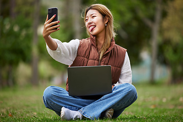 Image showing Selfie, asian and woman student in a park to update social media while outdoor studying and learning online. Internet, web and young person or influencer takes picture in nature for peace and calm