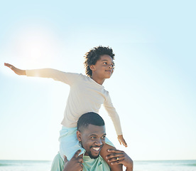 Image showing Happy father, child and beach fun with a dad and boy together with parent care and bonding. Outdoor, sea and summer holiday of a family on vacation in nature with happiness while playing with a smile