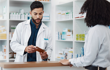 Image showing Pharmacy, man and customer with medicine, instructions and conversation in drug store, medical supplements and prescription. Male employee, female client and pharmacist with antibiotics or healthcare