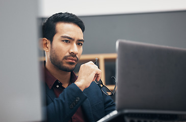 Image showing Administration laptop, serious and man reading finance spreadsheet, online banking payroll or financial accounting. Bookkeeping system, user focus and face of agent problem solving budget analysis