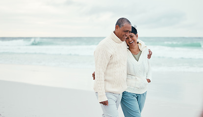 Image showing Senior couple, hug and beach walk together with funny moment, comic memory or conversation by sea. Happy retirement, ocean and outdoor embrace with love, bond or romance for laugh by waves on holiday