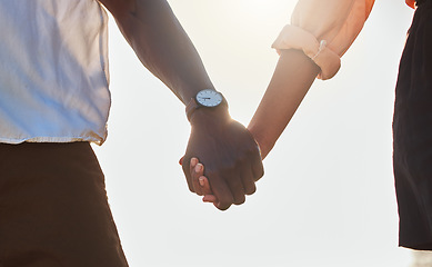 Image showing Love, flare and African couple holding hands, bonding and enjoy outdoor romantic quality time together. Peace, freedom and sunshine for calm black woman, man or people on marriage anniversary date