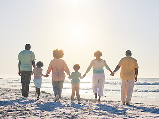 Image showing Family on the beach, holding hands and generations, travel and summer vacation, solidarity and love outdoor. Grandparents, parents and children on holiday, people together with back view in Cancun