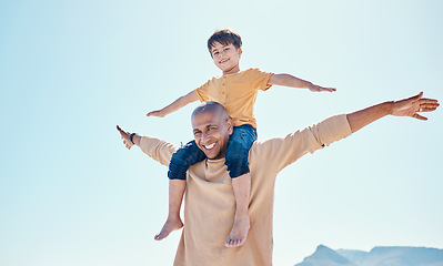 Image showing Smile, blue sky and father with child on shoulder for bonding, quality time and relaxing on weekend. Family, beach and happy dad flying with boy on summer holiday, vacation and adventure together