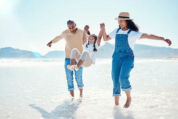 Image showing Mother, father and girl play on beach for bonding, quality time and summer adventure together in water. Travel, freedom and happy mom, dad and child enjoy holiday, vacation and relax on weekend