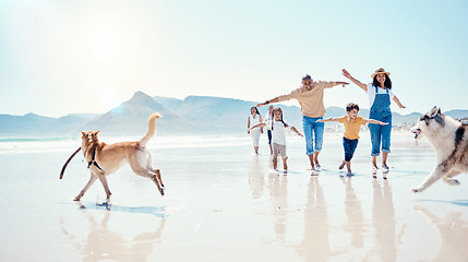 Image showing Family, beach and parents with children and dogs for bonding, quality time and adventure together. Travel, pets and happy mom, dad and kids enjoy summer holiday, vacation and relax on weekend by sea