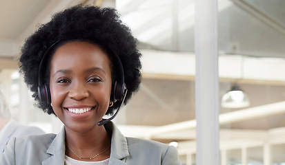 Image showing Black woman, face and working in call center, contact us and CRM, happy with customer service job in portrait. Female employee in workplace, headset and communication, help desk consultant in office