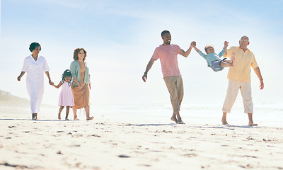Image showing Family on beach, freedom and travel, generations and happy people outdoor, grandparents with parents and kids. Adventure, carefree with dad and grandfather swing kid, fun and summer with hand holding