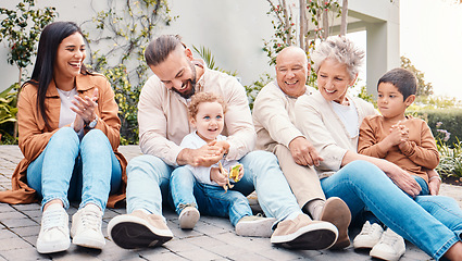 Image showing Family, generations and love, relax on lawn with happy people, grandparents with parents and children outdoor. Happiness, unity and support with care, together at home with bonding and diversity