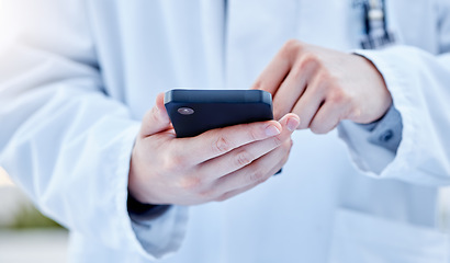 Image showing Closeup, hands and doctor with smartphone, online reading or connection for typing. Zoom, medical professional or cellphone for social media, research or search internet for information or healthcare