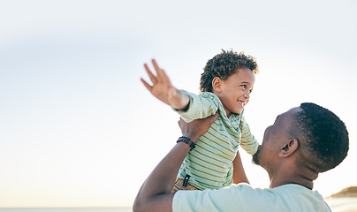 Image showing Father, child and beach fun with a black family on holiday by the sea with parent care and love. Ocean, freedom and boy in the air with dad,happiness and trust in nature on vacation with mock up