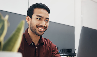 Image showing Face, happy and laptop with a business man in the office, working on a company project while sitting at his desk. Computer, smile and mission with a male employee typing an email or report at work