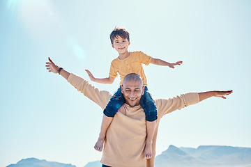 Image showing Family, beach and father with boy on shoulder by ocean for bonding, quality time and relaxing on weekend. Travel, smile and happy dad holding child on summer holiday, vacation and adventure together