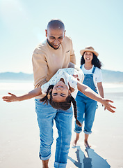 Image showing Family, beach and parents play with girl for bonding, quality time and adventure together by ocean. Travel, love and happy mom, dad and child enjoy summer holiday, vacation and relax on weekend