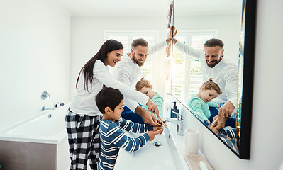 Image showing Family, washing hands and bathroom with a mom, father and children with hygiene care in morning. Mother, kids and dad together with love, support and youth in a home doing self care at a sink