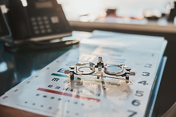 Image showing Ophthalmology, vision and optometry equipment with lenses and letter chart for examination test or exam for glasses. Eyesight, eyewear and medical tools for prescription spectacles or eye care