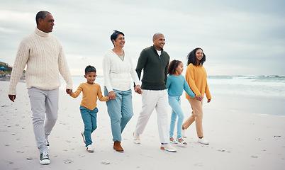 Image showing Happy grandparents, parents and children on beach enjoying holiday, travel vacation and weekend together. Big family, relax and happy people holding hands for bonding, quality time and walking by sea