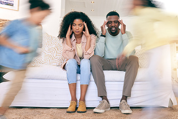 Image showing Children, running and tired parents on sofa with motion blur for energy, playing and hyper kids in living room. Black family, stress and mom and dad with headache, frustrated and fatigue at home