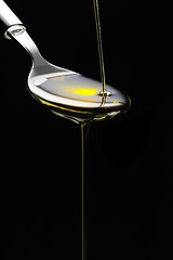 Image showing olive oil on a spoon