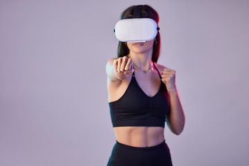 Image showing Fitness, vr or girl boxer in metaverse on studio background digital gaming on cyber sports with mock up. Woman, fist or virtual reality user fighting or gamer boxing in futuristic 3d ai experience