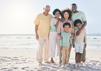 Image showing Smile, hug and portrait of a happy family at a beach for travel, vacation and holiday on nature background. Relax, face and trip with children, parents and grandparents bond while traveling in Cancun