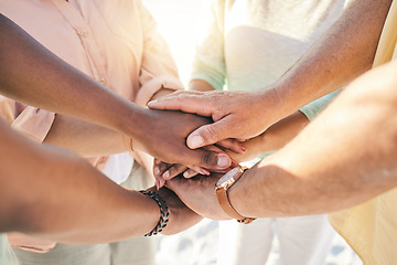 Image showing Group of people hands stacked outdoor for teamwork, community support and collaboration in prayer or faith. Circle of friends closeup with hand together sign for solidarity, praying and team building