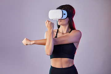 Image showing Virtual reality, fitness and woman stretching in metaverse studio isolated on a purple background. 3d exercise, vr and female athlete warm up, workout or training with futuristic headset for esports.