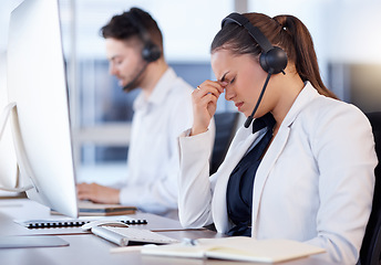 Image showing Tired girl, headache or call center consultant with burnout is overworked by telemarketing deadline at help desk. Depressed or exhausted woman frustrated with job stress, migraine pain or fatigue