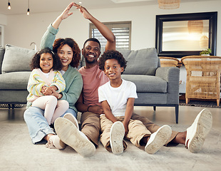 Image showing Family, portrait and protection, love and insurance for security with parents and children. Hands together, roof and happy people in living room, unity and safety for life and home cover with smile