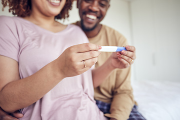 Image showing Pregnancy test in hands, happiness with fertility and people having a baby, happy couple with love and care at home. Interracial, black man and pregnant woman, start family with new mother and father