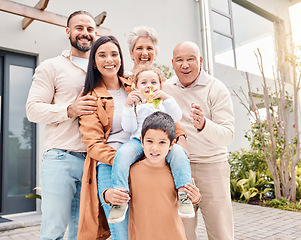 Image showing Big family portrait, man and woman with kids, grandparents and smile together at holiday home with love. Parents, children and generation with happiness, care and bonding in summer sunshine at house