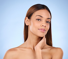 Image showing Cosmetic, natural and portrait of woman beauty with smooth clear skin after treatment or facial isolated in a studio blue background. Soft, self care and clean model due to dermatology or skincare