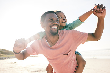 Image showing Child, black man and piggy back on beach on playful family holiday in Australia with freedom, fun and energy. Travel, fun and happy father and girl with smile playing and bonding together on vacation