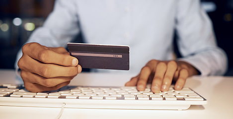 Image showing Online shopping, computer keyboard and man hands with credit card for digital bank payment, fintech or finance sale. Night, ecommerce banking trade and customer search retail product on store website