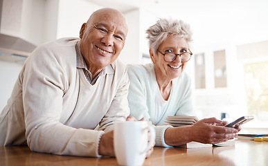 Image showing Portrait, senior and old interracial couple relax in home kitchen in the morning with coffee happy, smile and confident together. Old man and elderly woman on counter enjoying retirement in happiness